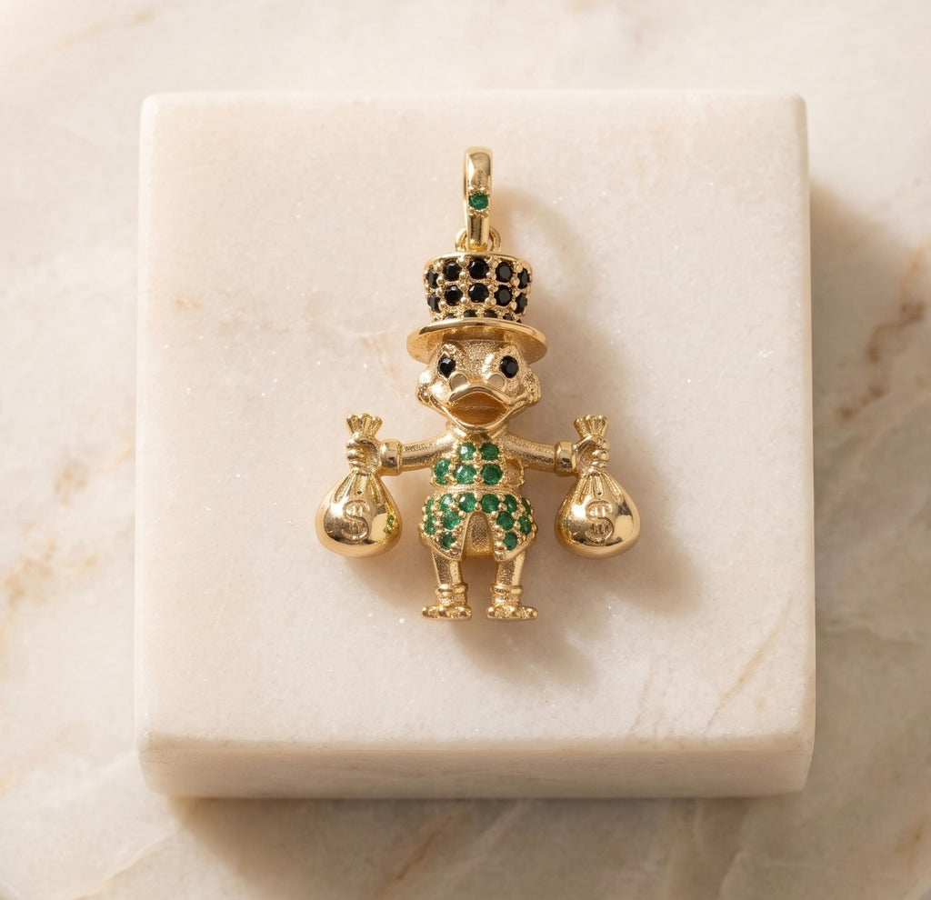 Dije Pato Tío Rico de la Abundancia con Circones – Oro Laminado 18K